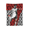 A soccer player in a white and black jersey is shown against a background of red and black repeating letters on a throw blank