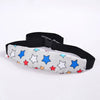 Black adjustable baby car seat head support with a white fabric featuring colorful star shapes