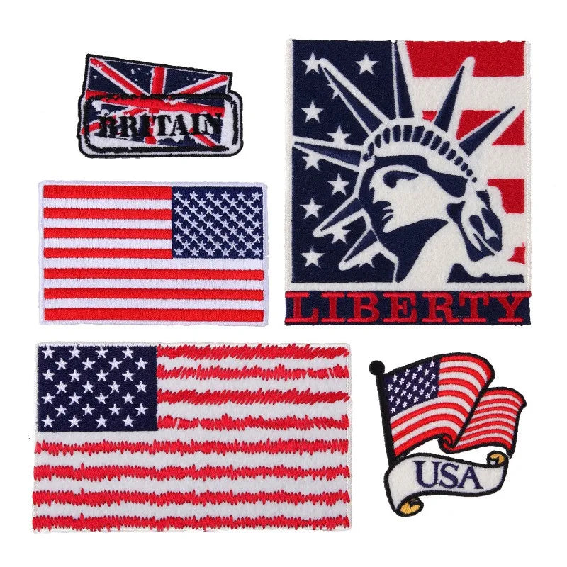 A collection of embroidered patches featuring the British flag, the United States flag, and a liberty motif.