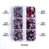 A clear plastic container holding various sizes of fuchsia glass rhinestones in different quantities and colors.