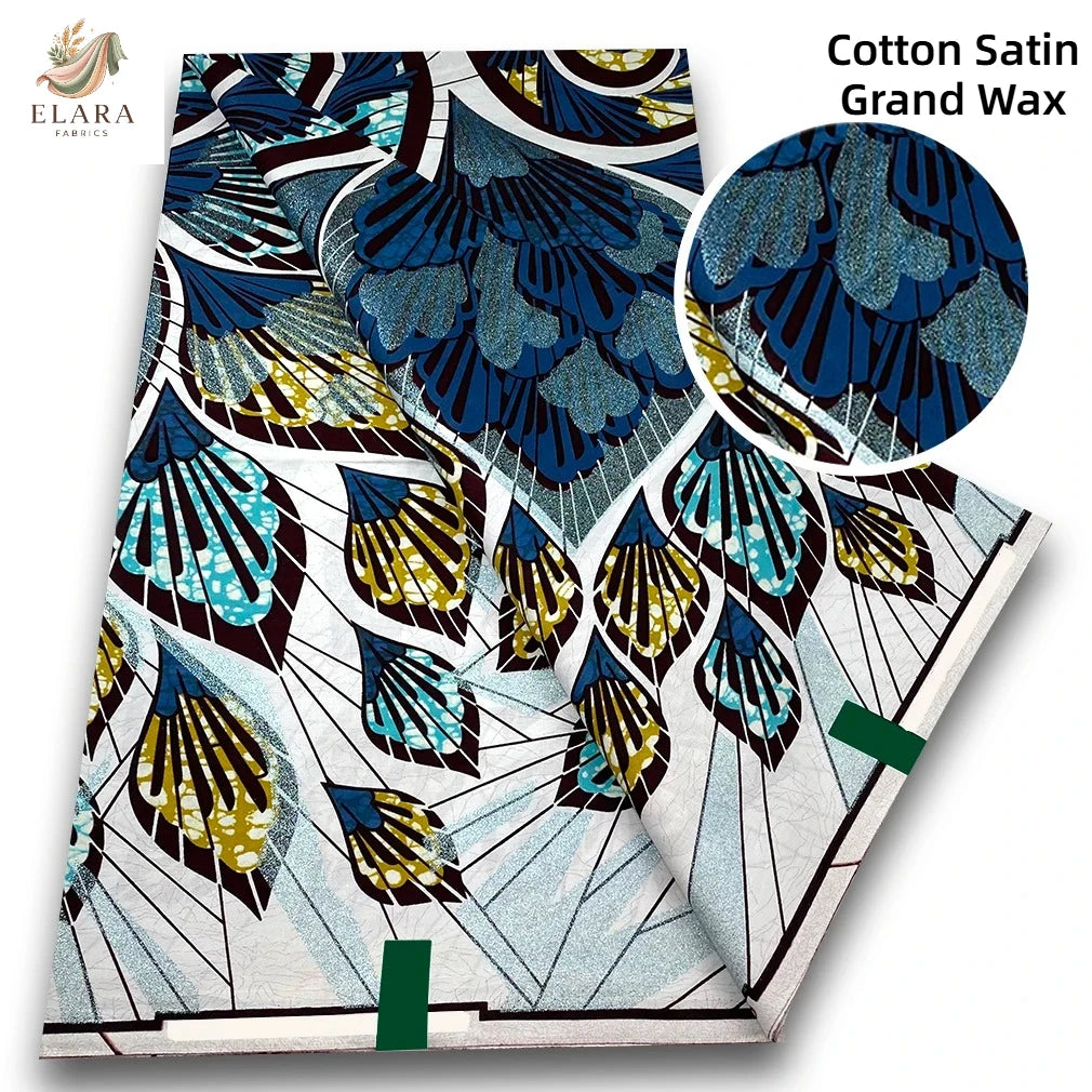 Cotton Satin Grand Wax fabric featuring blue and gold leaf patterns