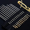 A close-up of a stainless steel sewing kit with various size needles and a gold-colored tool.