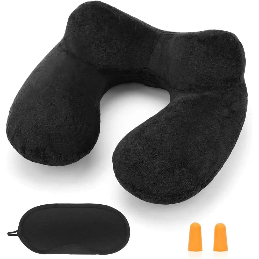 Black inflatable travel pillow with a soft velvet cover and an orange accessory.