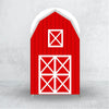 A red wooden barn-style arch backdrop cover with white cross patterns.