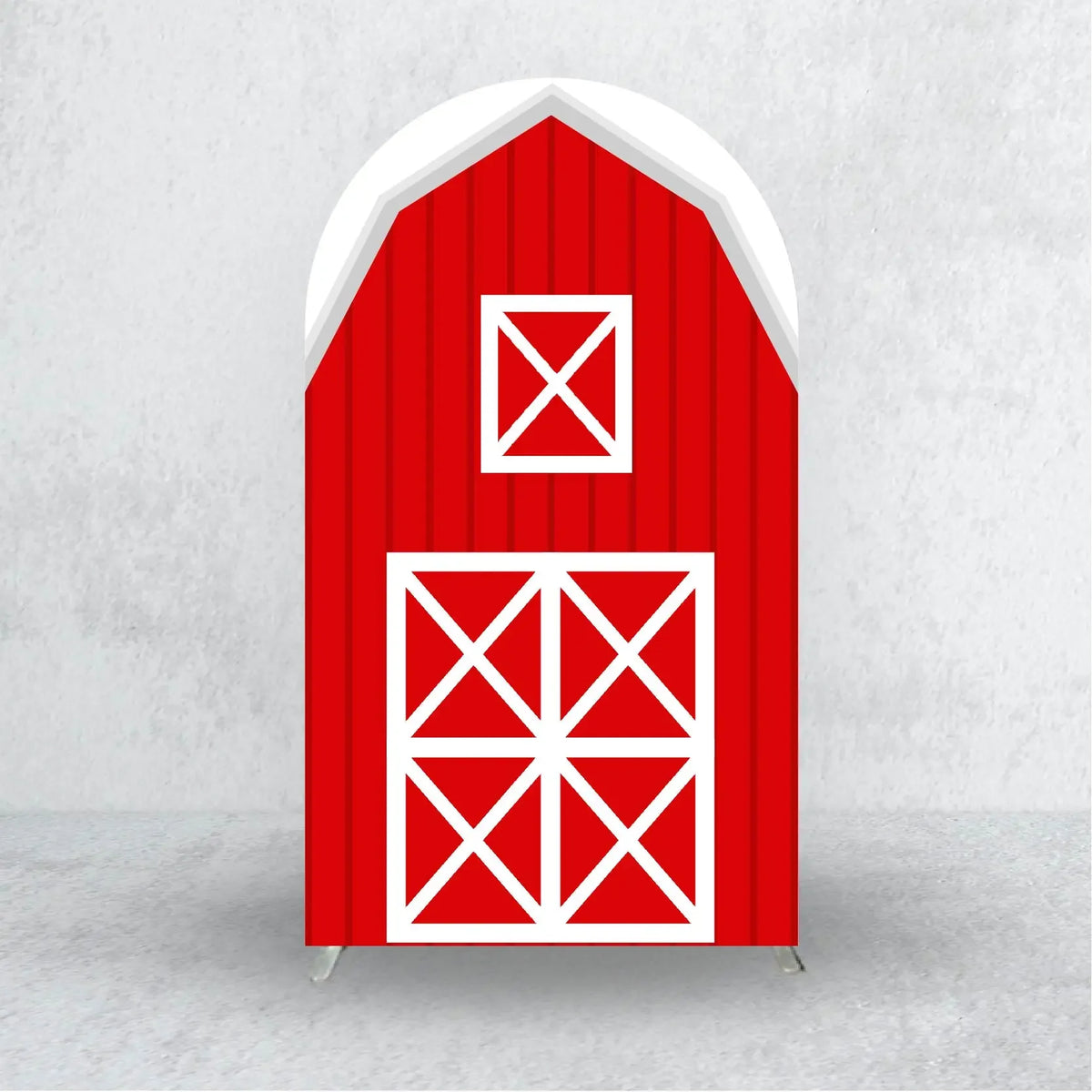 A red wooden barn-style arch backdrop cover with white cross patterns.