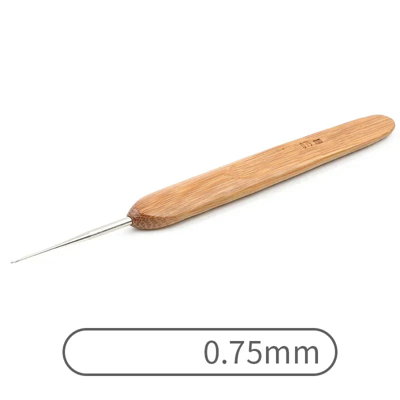 A wooden crochet knitting needle with a 0.75mm tip.