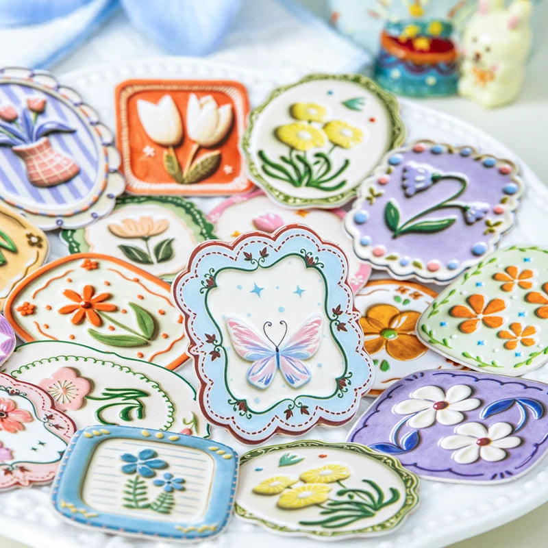 A collection of vintage botanical flower stickers featuring various colors and designs for journaling and scrapbooking.