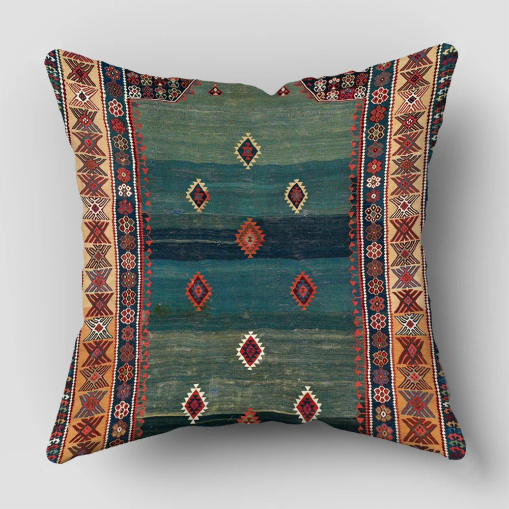 A square decorative cushion cover featuring a Persian pattern in teal, blue, and rust tones.