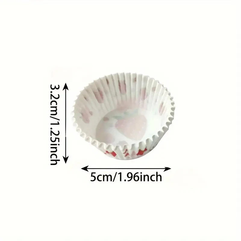 A white paper baking cup with a strawberry pattern, shown with dimensions of 3.2cm by 5cm.
