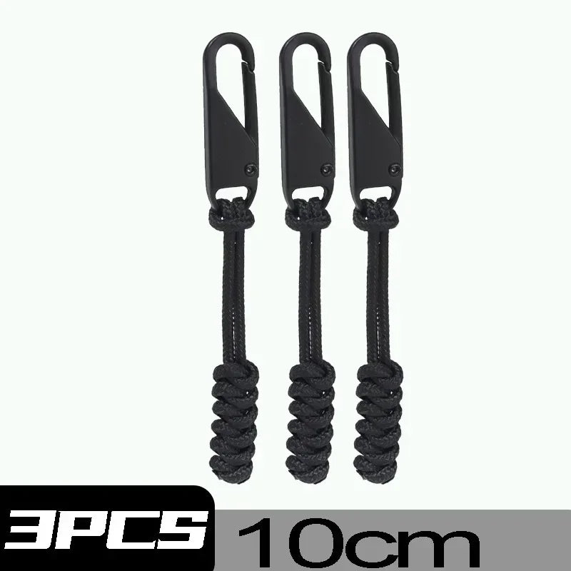 Three black detachable zipper pull sliders for bags and clothing