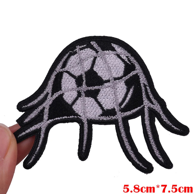 Black and white embroidered soccer ball hand patch with five fingers