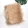Light beige faux fur plush fabric used for sewing and crafting