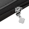 A close-up of a silver metal zipper pull replacement kit attached to a black fabric zipper.