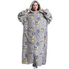 A woman models a gray sherpa fleece oversized blanket hoodie patterned with cute panda faces on a light background.