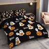 A black duvet cover set featuring a pattern of white and orange ghosts and pumpkins.