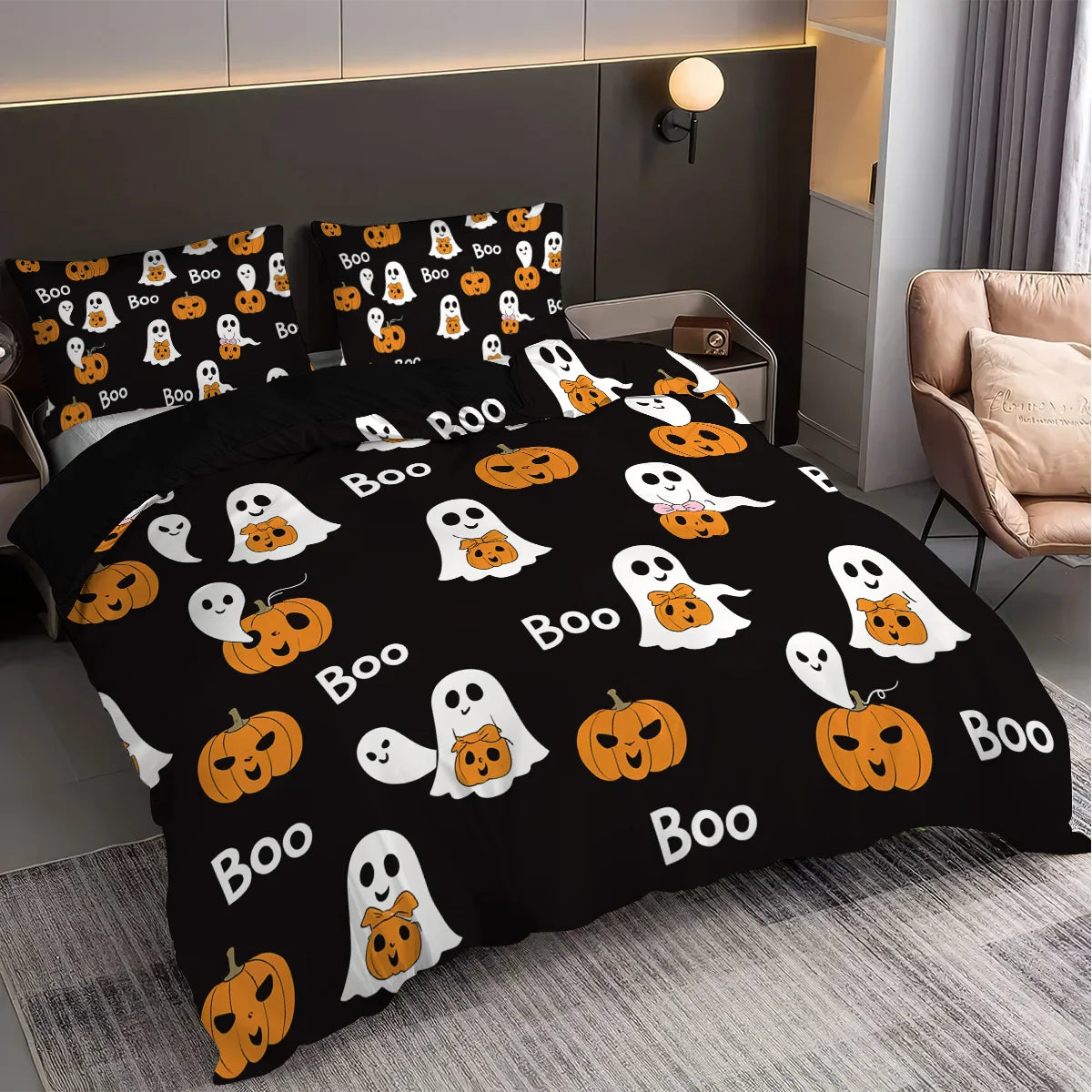 A black duvet cover set featuring a pattern of white and orange ghosts and pumpkins.