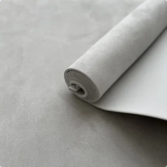 Roll of light gray suede auto headliner fabric with foam backing