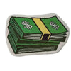 A rectangular rug featuring a green, folded dollar bill design with gold accents.