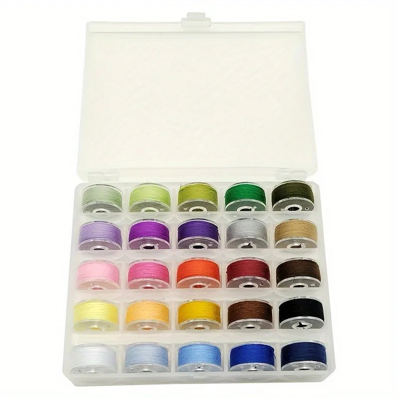 A clear plastic box containing various colored pre-wound sewing machine bobbins with thread.