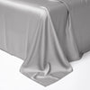 A smooth, draped gray luxury Egyptian cotton bedding set fabric.