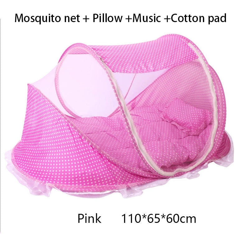Pink mosquito net with a pillow and cotton pad for infant use