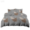 Gray duvet cover set featuring a floral plant print design with white and brown foliage patterns.