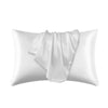 A white silky satin pillowcase is shown folded, ready for use on hair or skin.
