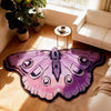 A purple and pink irregular shaped plush floor rug is displayed on a wooden floor next to a white sofa.