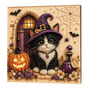 Diamond painting kit featuring a black cat with purple accents and an orange pumpkin on a canvas.