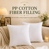 White PP cotton fiber filling for pillows shown on a sofa with decorative lighting.