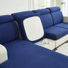 A deep blue Jacquard elastic sofa cushion slipcover with a white backrest shown in a living room setting.