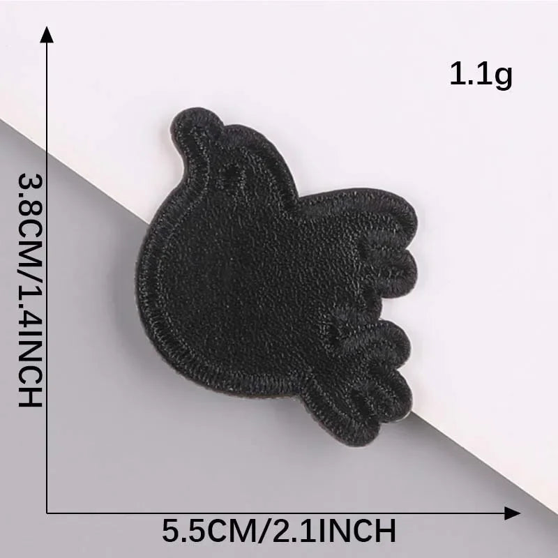 A black embroidered leather patch is shown against a white background, with dimensions of 1.1g and 5.5cm.