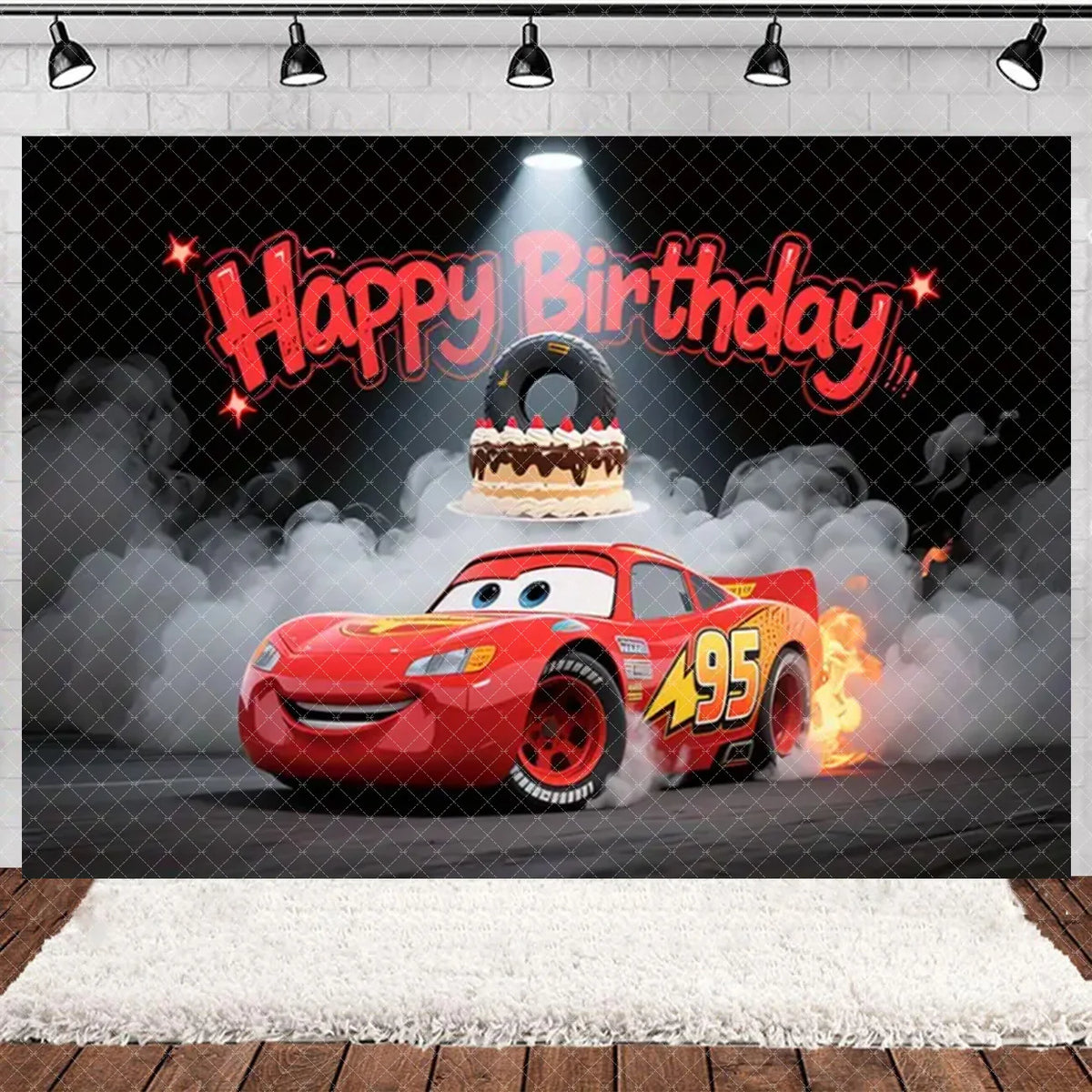A red cartoon race car with flames is featured in a birthday party backdrop with a happy birthday sign and smoke effects.