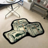 A black decorative floor rug featuring rolled US dollar bills and a portrait of a person.