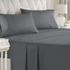 A gray luxury microfiber 4-piece bed sheet set with deep pockets is displayed on a bed with a white upholstered headboard.