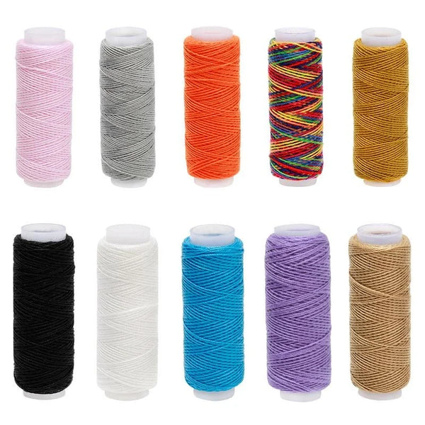 A collection of ten rolls of heavy duty denim sewing thread in various colors including pink, gray, orange, green, yellow, bl
