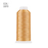 A roll of gold-colored polyester embroidery thread with a white core.