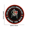 Circular patch design featuring a shield with a cross and text that reads Put on the full armor of God Defend the faith