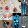 A collection of stainless steel eye screw pins and jewelry findings in various sizes and finishes.