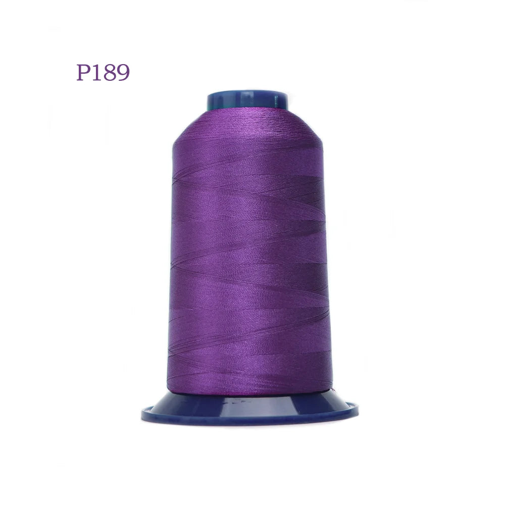 A spool of purple high tenacity polyester embroidery thread with a blue cap.