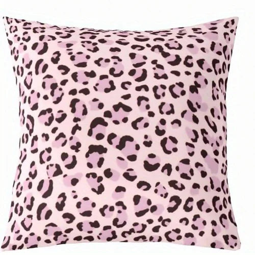 A square decorative pillow cover with a pink leopard print pattern.