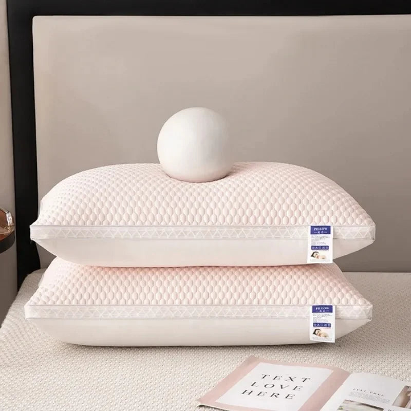 A stack of two white textured cooling therapy pillows resting on a light surface.