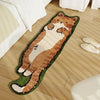 A long, brown and white cartoon cat plush rug lying on a light wooden floor.