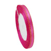 Roll of 6mm gold-edged satin ribbon in bright pink for gift wrapping and crafts