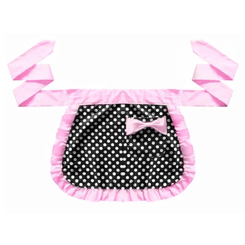 Pink ruffle apron with pockets featuring a black polka dot pattern and a pink bow