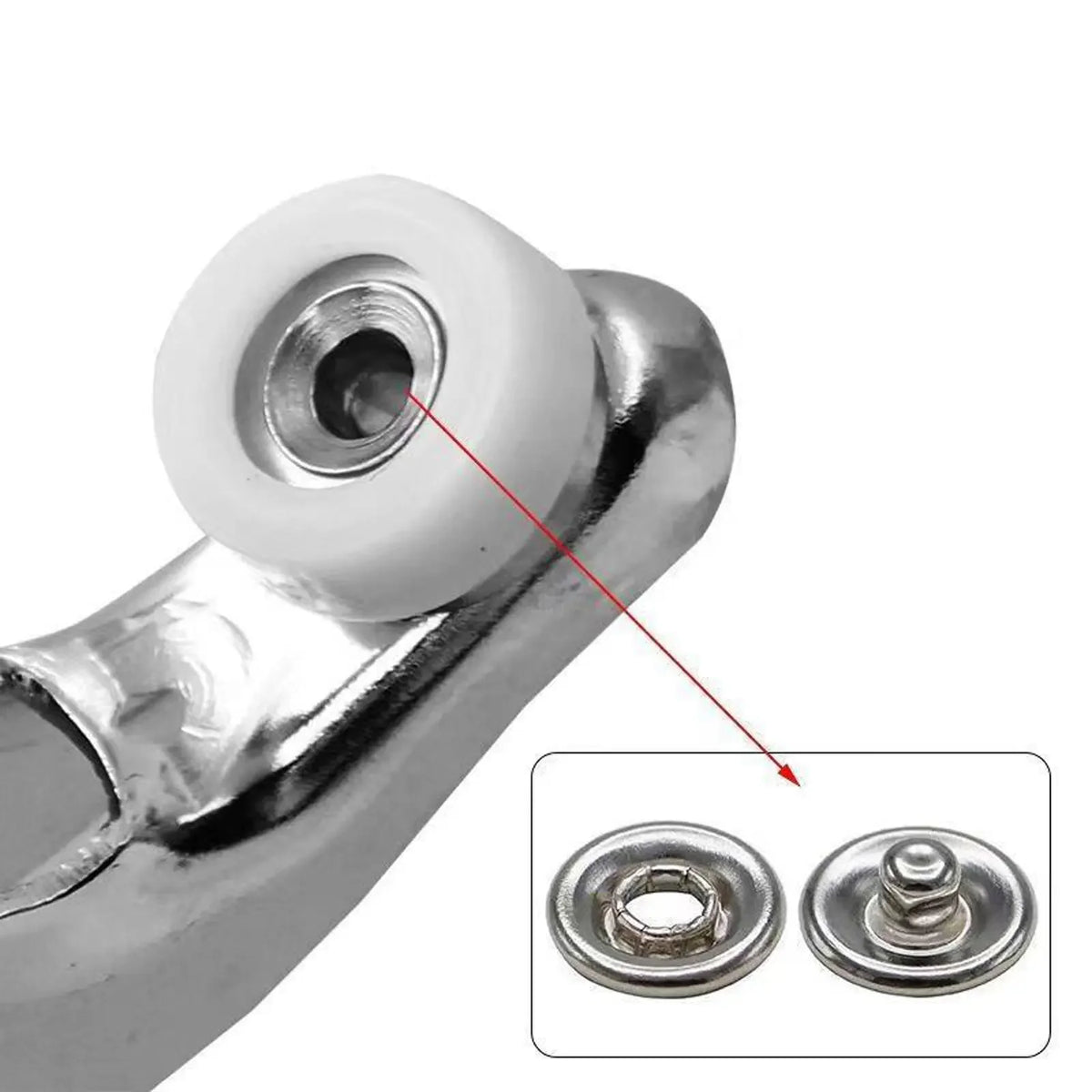 Close-up view of a metal snap button and press tool components for a kit.