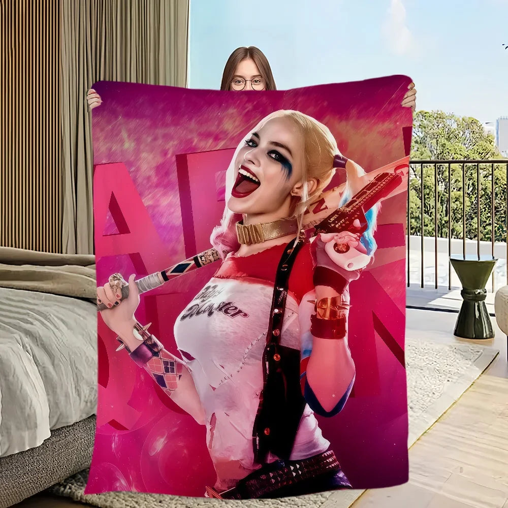 A vibrant pink and magenta poster featuring a woman with blonde hair wearing a red outfit and holding a guitar.