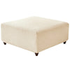 A square ottoman or stool cover in a light beige stretch jacquard fabric.