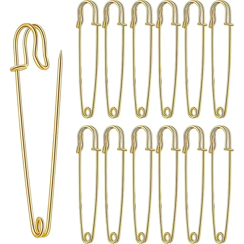 A set of ten heavy duty stainless steel safety pins in gold tone