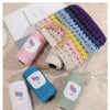 A collection of colorful hollow cotton rope yarn in various shades and textures displayed on a light background.